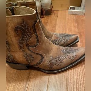Tan Corral cowboy boots.